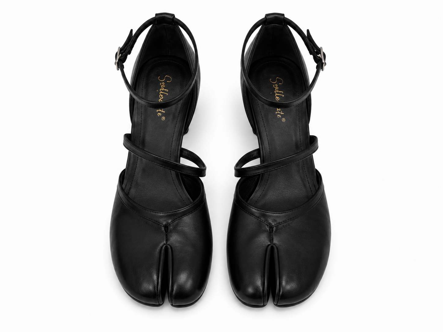 A pair of black leather tabi-style heeled sandals with ankle straps, shown from a top-down view on a white background. The brand name 'Sakura K' is printed in gold on the insole.